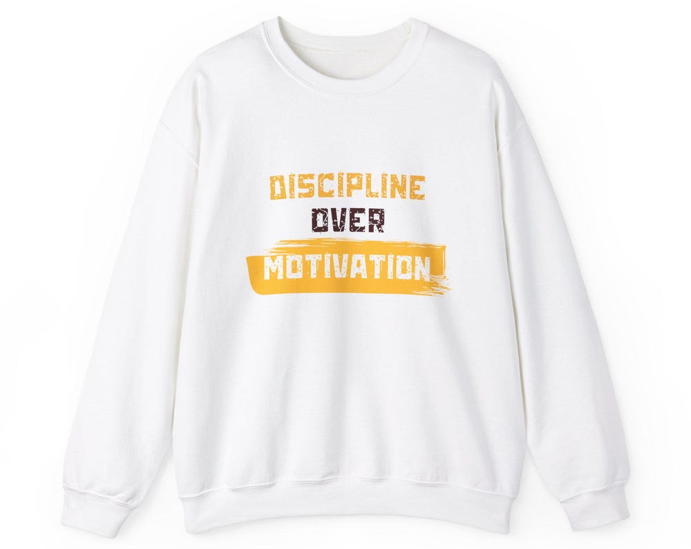 DISCIPLINE OVER MOTIVATION Unisex Sweatshirt